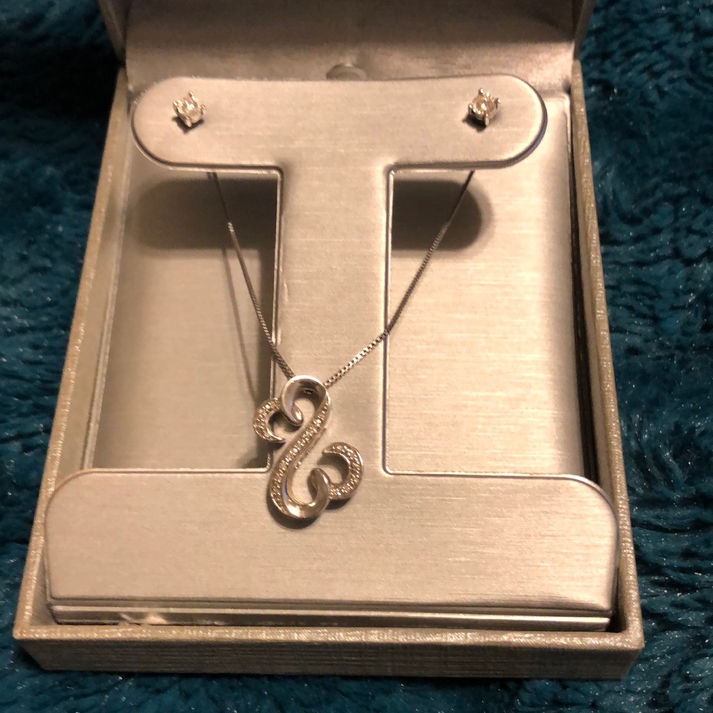 Zales swirl pendant with 1/10 CTTW earrings